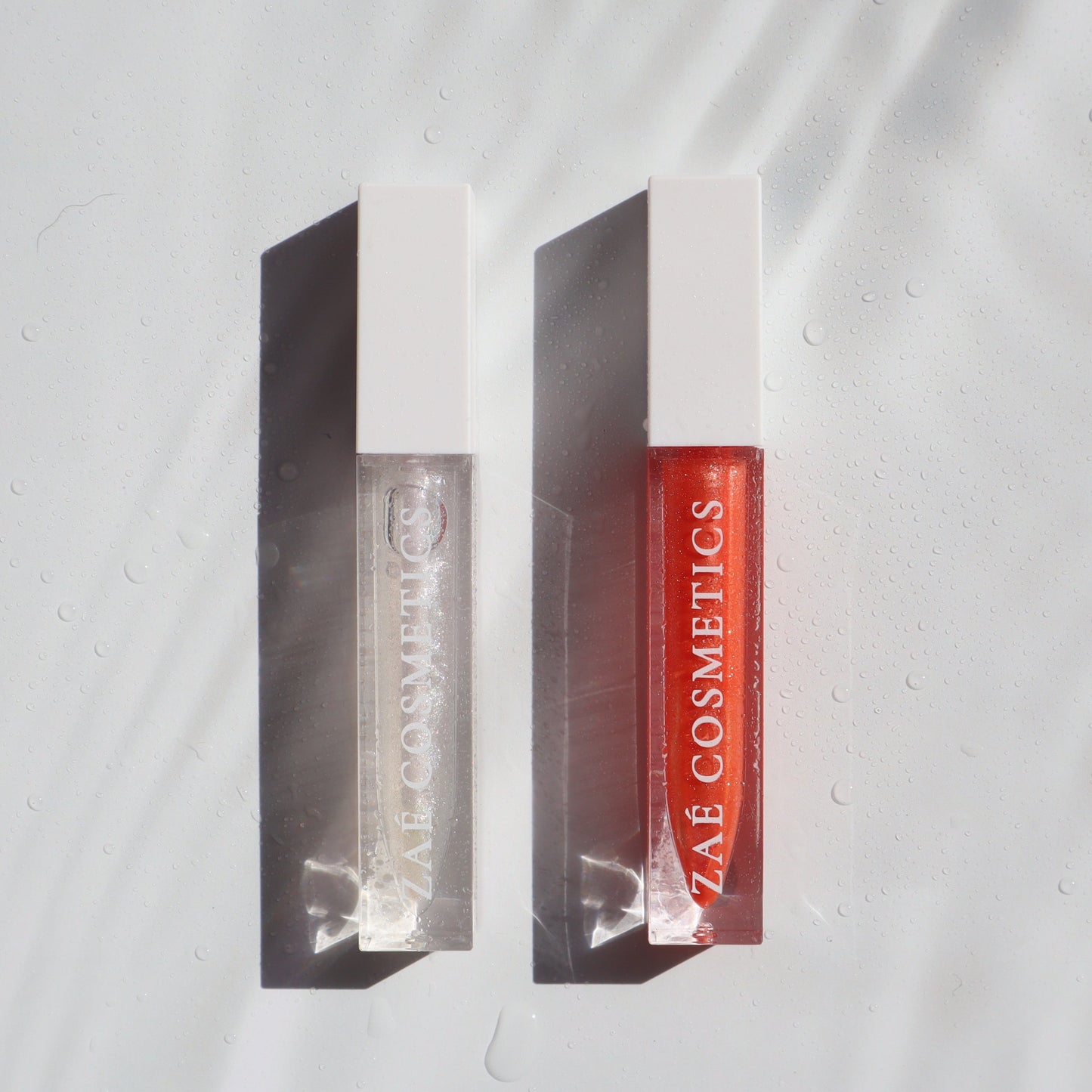 "Zaé shimmer lip gloss vegan sparkle"
"Zaé shimmer gloss cruelty-free glossy finish"
"Zaé shimmer lip gloss swatches shimmering"
"Zaé shimmer gloss packaging Zaè Cosmetics"